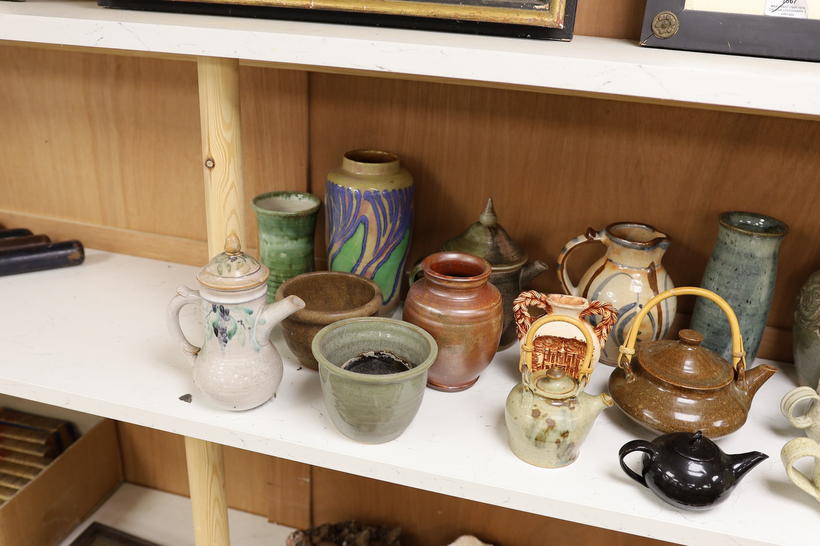 A large quantity of British studio pottery teapots, mugs, jugs and other miscellaneous items, to include a vast amount by Susan Threadgold